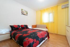 Postel nebo postele na pokoji v ubytování Apartments Milic