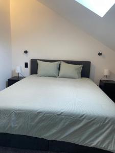 Postel nebo postele na pokoji v ubytování grand duplex rénové