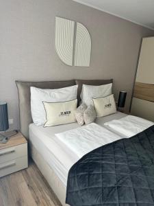 Postel nebo postele na pokoji v ubytování Haus Ilmer