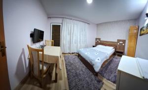 Postel nebo postele na pokoji v ubytování Evropa