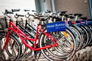 a row of bikes parked next to each other at Best Western Hotel Botnia in Umeå