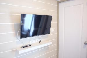 TV a/nebo společenská místnost v ubytování Prix Hotel
