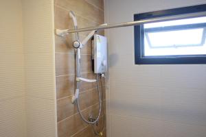 Koupelna v ubytování Prix Hotel