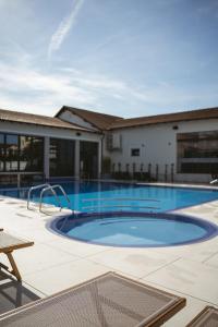 Bazén v ubytování ALLEGRIA HOTEL Spa nebo v jeho okolí