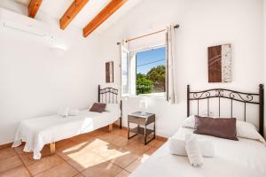 Ένα ή περισσότερα κρεβάτια σε δωμάτιο στο Villa CASSIA