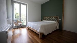 Postel nebo postele na pokoji v ubytování Casa Gaggio