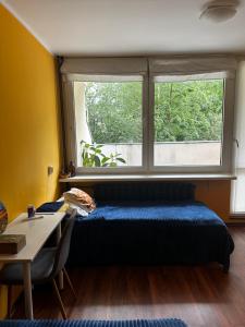 Posteľ alebo postele v izbe v ubytovaní Travel House Wroclaw