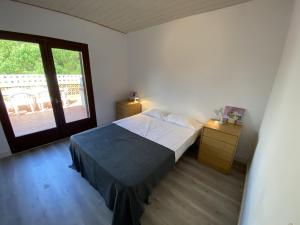Postel nebo postele na pokoji v ubytování Rec Dalt - Mas Pinell