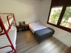 Postel nebo postele na pokoji v ubytování Rec Dalt - Mas Pinell