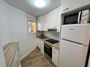 Dapur atau dapur kecil di Apartamenticos Libertad I +11 gambar