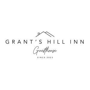 un logo pour un magasin de meubles avec une maison en arrière-plan dans l'établissement Grants Hill Inn, à Bloemfontein