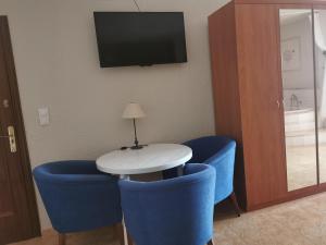 TV a/nebo společenská místnost v ubytování Hotel Castellverd