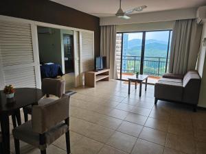 TV a/nebo společenská místnost v ubytování Afamosa Resort Dsavoy Condo