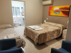 Postel nebo postele na pokoji v ubytování Hotel Castellverd