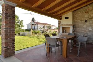 Patio nebo venkovní prostory v ubytování Villa Pomegrana