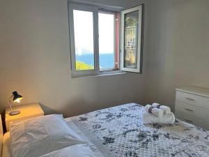 Postel nebo postele na pokoji v ubytování Apartman Vanja