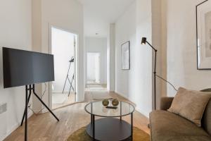 TV a/nebo společenská místnost v ubytování Come Stay 4BR med plads til 7 i hjertet af Aarhus