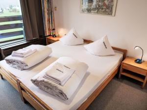 Postel nebo postele na pokoji v ubytování Apartment Apt B 072 by Interhome