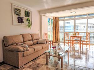 a living room with a couch and a table at Apartment Halcon Levante by Interhome in Benidorm