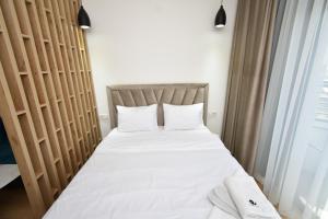 Postel nebo postele na pokoji v ubytování To blue moon 8