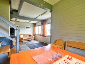 a room with a table and a dining room at Holiday Home Dorf 1-Haus 14 by Interhome in Kirchheim +33 photos