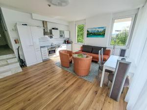 a living room with a couch and a table at Apartment Vinzek by Interhome in Töschling