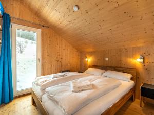 Postel nebo postele na pokoji v ubytování Chalet Klippitzoase by Interhome