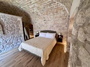 Postel nebo postele na pokoji v ubytování Suite Maiella
