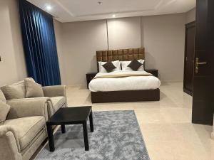 Voodi või voodid majutusasutuse يان للشقق المخدومة - Yan Apartments toas