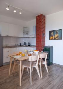 Kuchyň nebo kuchyňský kout v ubytování Apartment Sea View 1