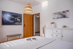 Postel nebo postele na pokoji v ubytování Apartment Sea View 1