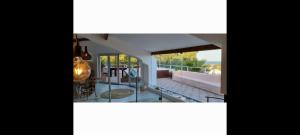 a view of the house from the balcony at Soltroia Dunas House in Troia