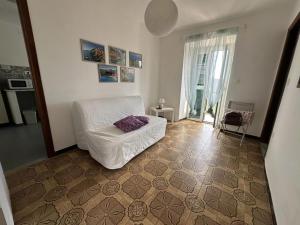 Postel nebo postele na pokoji v ubytování Cà Rosa de Drignana