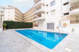 Bazén v ubytování TuristMar - Amplio Apartamento en Salou con piscina, a 2 minutos de la Playa nebo v jeho okolí