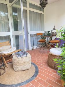 Posezení v ubytování Suite con giardino Ravenna