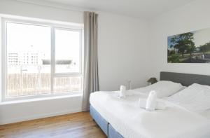 Кровать или кровати в номере Luxurios 3-bed w balcony and great views