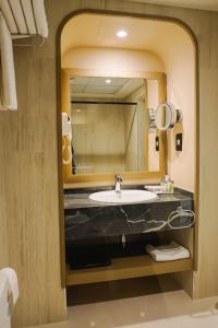 Koupelna v ubytování Sheraton Khalidiya Hotel