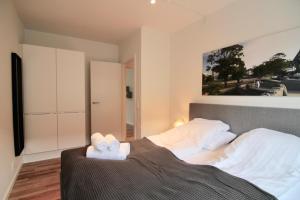 Postel nebo postele na pokoji v ubytování Nice 2-bed in Frederiksberg