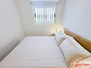 Postel nebo postele na pokoji v ubytování Verano de Ensueño