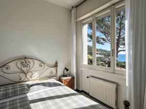 A bed or beds in a room at Holiday Home Alfreda - SLR101 by Interhome