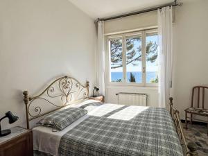 A bed or beds in a room at Holiday Home Alfreda - SLR101 by Interhome