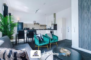 a living room with a couch and chairs and a kitchen at 25 percent OFF Monthly Stay By NYOS PROPERTIES Short Lets & Serviced Accommodation Manchester Business Leisure in Manchester