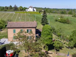 an aerial view of a house with a field and a barn at Holiday Home Il Valletto by Interhome in Mombaruzzo