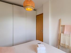 Posteľ alebo postele v izbe v ubytovaní Apartment San Vincenzo-1 by Interhome
