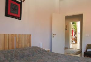 Postel nebo postele na pokoji v ubytování B&B CasaGiò