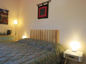 Postel nebo postele na pokoji v ubytování B&B CasaGiò + 8 fotografií