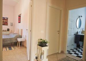 Postel nebo postele na pokoji v ubytování B&B CasaGiò