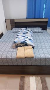 Katil atau katil-katil dalam bilik di CG BNB HOTEL