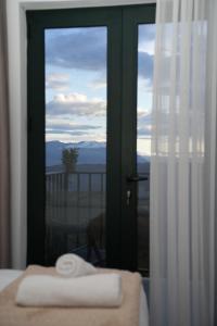 Postel nebo postele na pokoji v ubytování Vila Sofia Gllava - Resort