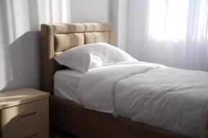 Postel nebo postele na pokoji v ubytování Vila Sofia Gllava - Resort